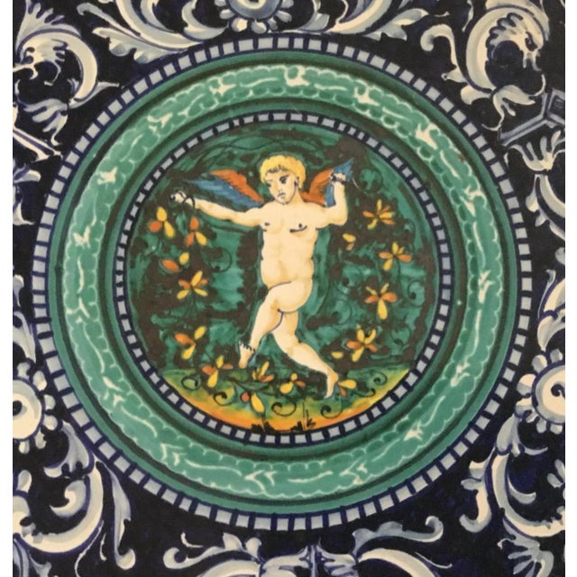 Photo does not do this piece justice. The colors are really saturated. I was shopping in Italy for ceramics and in a sea...