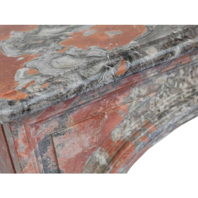 A 19th century antique french louis philippe marble fireplace mantel. Hand carved in unusual rouge grey italian marble....