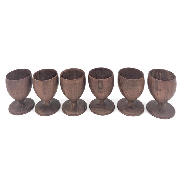 Offered is a set of 6 turned and lathed E.S.A. brand Teak wood egg cups made in Denmark some time between the late 1950s...