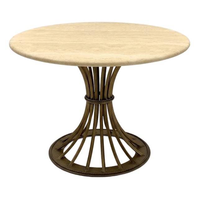 This is a fabulous organic modern travertine and gilt iron center or small dining table by Kreiss out of California....