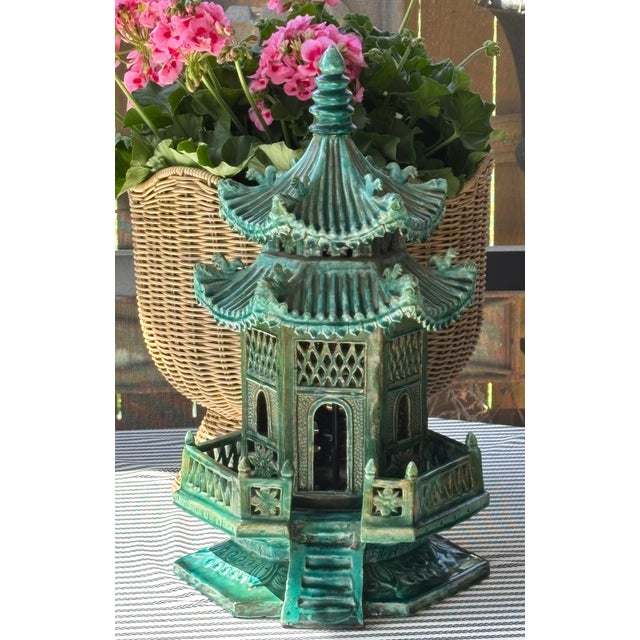 This pagoda would be the perfect centerpiece for your summer soirée given the dramatic scale and sculptural presence....