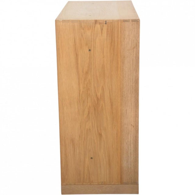 Mogens Koch deep bookcase made of oak. The bookcase is from the 1980s and appears with some marks and scratches....