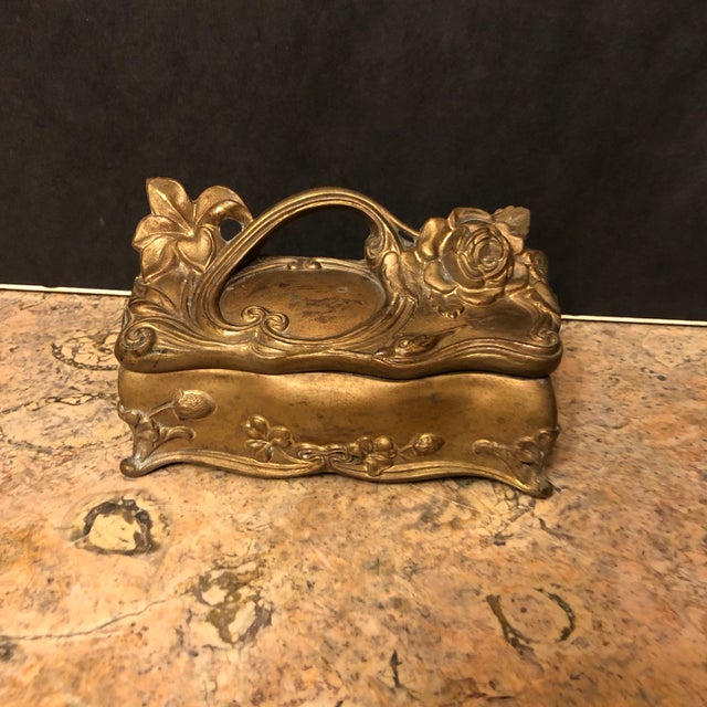 Perfect for gifts, jewelry, desk storage, on a table, or in a cabinet / bookcase. Gold Colored Metal Hinged Box With...