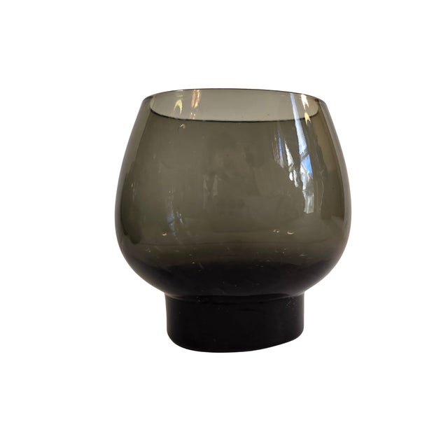 A distinguished set of six smoky-green lowball tumblers attributed to Per Lütken for Holmegaard. These hand-blown glasses...