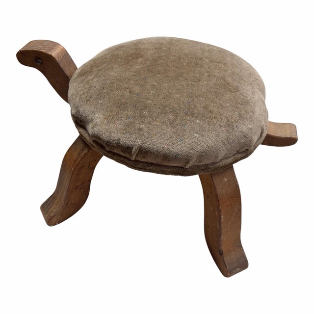 Vintage turtle footstool with round upholstery foot rest in a light brown velvet with bird’s eye pattern in light blue,...