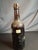 Note: This item is a 20th-century historical artifact: an empty wine bottle that carries documented provenance from the...