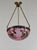 établissement Émile Gallé A French art deco hanging fixture in gild bronze with a Gallé bowl in acid-engraved cameo glass....