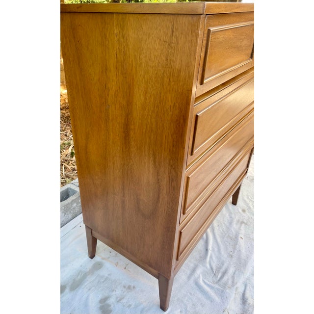 Vintage Mid-Century Modern highboy chest by Dixie Furniture Co., constructed of walnut veneer over a solid hardwood frame....