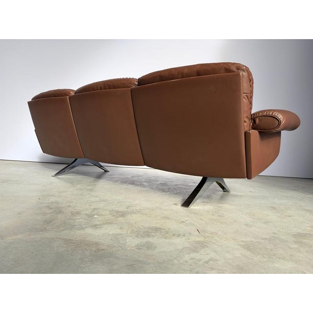 Beautiful chocolate brown leather sofa model DS31 designed and produced by De Sede. One of our personal favorites from de...