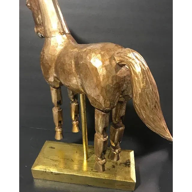 This is unique 3 pieces gold reticulated wooden horse standing on a platform. All 4 legs movable Great decor piece for any...