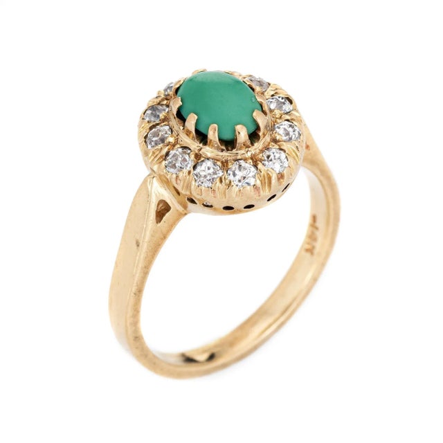 Finely detailed antique Victorian era ring (circa 1880s to 1900s) crafted in 14k yellow gold. Turquoise cabochon measures...