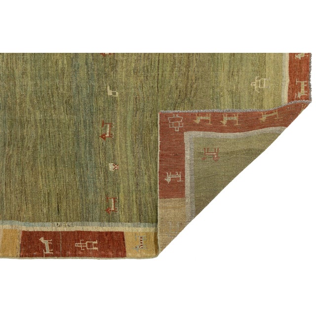 Contemporary Modern Hand-Knotted Gabbeh Wool Rug – Earth Tones With Minimalist Animal Motifs For Sale - Image 3 of 8