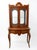 An exquisite French Louis XV style vitrine cabinet (display cabinet on stand), crafted with exceptional artistry. This...