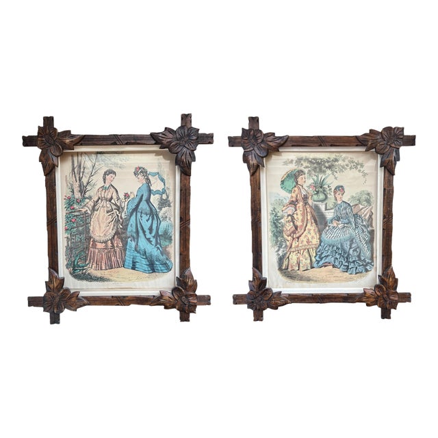 Pair of Victorian Fashion Engravings in Carved Black Forest Frames, 19th C. For Sale