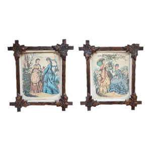 Pair of Victorian Fashion Engravings in Carved Black Forest Frames, 19th C.