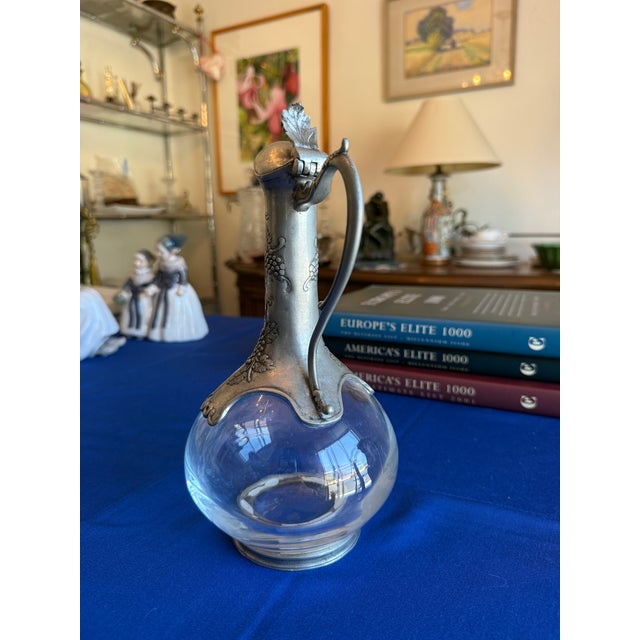This vintage "Etain" Pewter Wine/Liquor Carafe is a handmade piece originating from France. The carafe is crafted from...