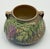 A classic example of American Art Deco pottery, this Roseville Pottery Wisteria vase dates to the early 1930s and features...