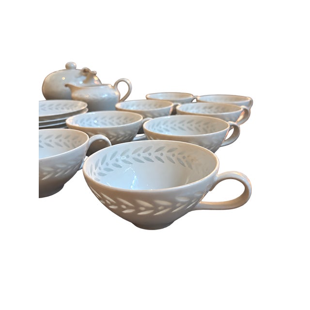 Beautiful vintage Seyei Fine China collection featuring an elegant white finish with a delicate gray leaf pattern This...