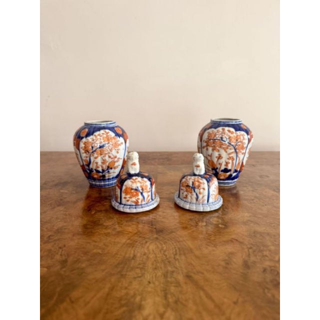 Quality pair of antique Japanese Imari lidded vases having a pair of quality antique Imari vases with wonderful hand...