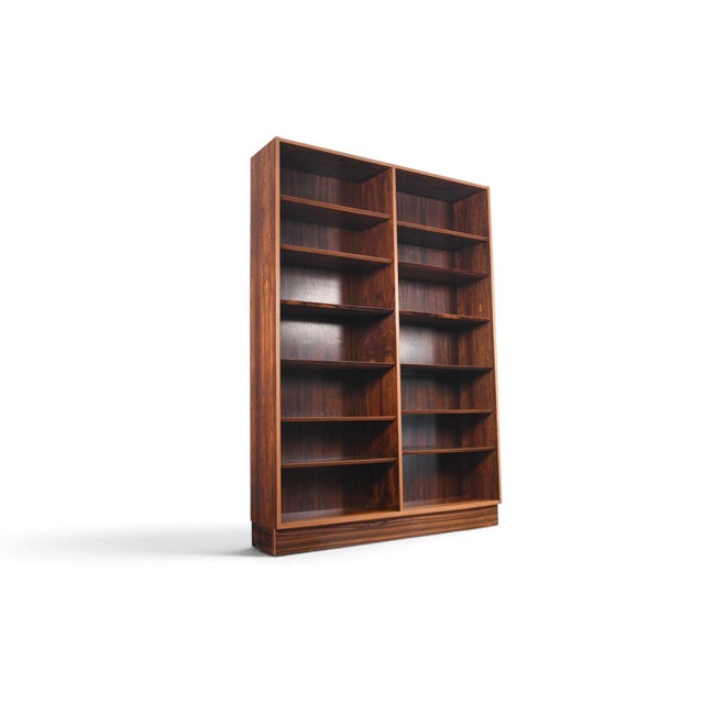 This is the third of a matching set of double bookcases designed by Carlo Jensen and produced by Hundevad and Co in...