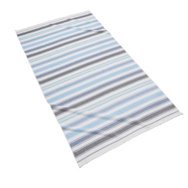 With colorful stripes and eyelash fringe details, our Pareo Fouta Beach Towel is the epitome of chic summer style. 100%...