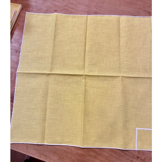 Set of 8 yellow linen placemats (12 x 18) and napkins (18 x 18) with white stitched borders and inset. New