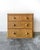 A charming antique English chest of drawers. A versatile two over there drawer formation, perfect as a bedside table, or...