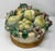 Majolica centerpiece in classic trompe l'oeil style, designed to look like a realistic, three-dimensional arrangement of...