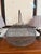 Exceptional very large wire egg basket.I shipped it home from Provence, France many years ago and it's happily lived in my...