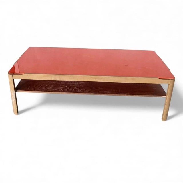 This mid century coffee table combines striking design and practical function to elevate your living space. The custom...