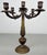 An elegant Vintage Italy candelabra featuring five sweeping arms and highly decorative detailing throughout, with an...
