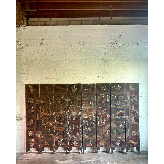 This exceptional eight-panel Coromandel screen is a rare example of traditional Chinese lacquer artistry, offering a...