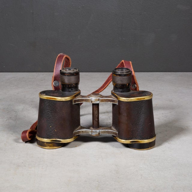 ABOUT An antique Carl Zeiss Jena binoculars and original leather case, manufactured in Germany in 1921. Clear lenses and...