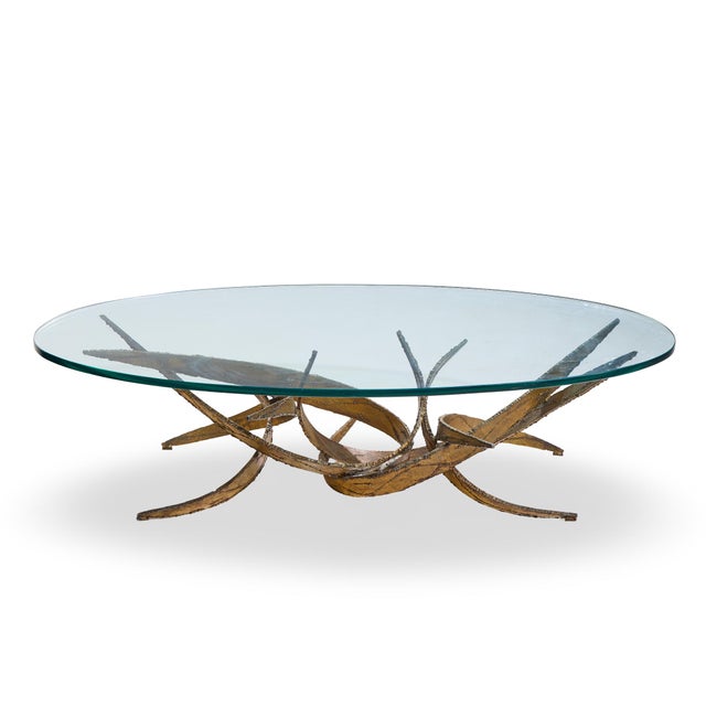 Silas Seandel Brutalist Mid Century Glass and Gilt Bronze Coffee Table This coffee table measures: 59.5 wide x 29.5 deep x...