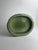 This celadon Rookwood dish, marked XLIV (44) for the year 1944 and model number 6817, is a graceful example of mid-20th-...