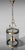 Elegant French suspended lantern crafted in brass with a transparent blown glass cylindrical diffuser. This piece...