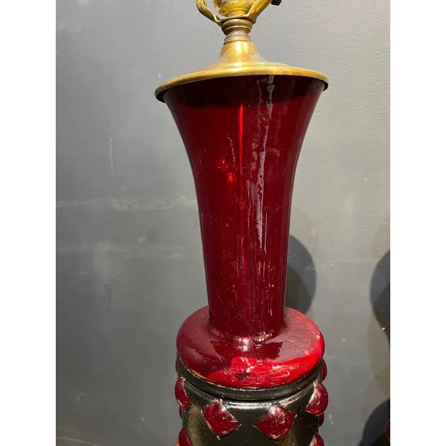 A circa pair 1920’a Italian blown red glass with brass bases table lamps