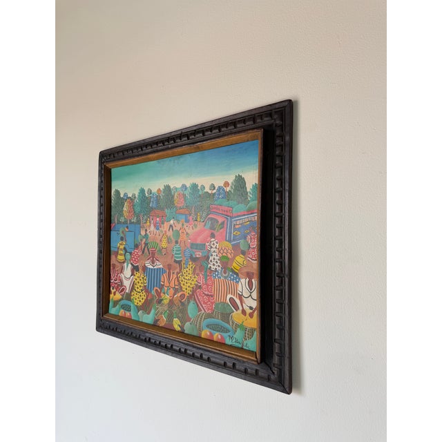 Folk Art M. Bazile Haitian Folk Art Market Scene Oil on Masonite Board – Framed For Sale - Image 3 of 12