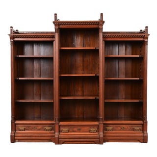 Herter Brothers Style Antique Eastlake Victorian Carved Walnut and Burl Wood Triple Bookcase, Circa 1880s For Sale