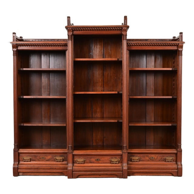 Herter Brothers Style Antique Eastlake Victorian Carved Walnut and Burl Wood Triple Bookcase, Circa 1880s For Sale