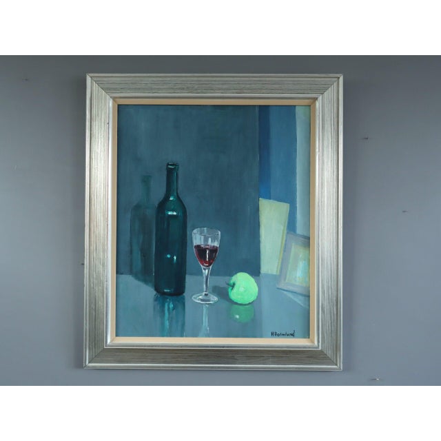 GREEN APPLE WITH GLASSES Size: 27.8 x 24.2 inches (including frame) Oil on canvas A refined mid-century still life that...