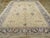 An antique Turkish Oushak room size carpet. This mellow-toned western Turkish workshop room size carpet has a straw yellow...