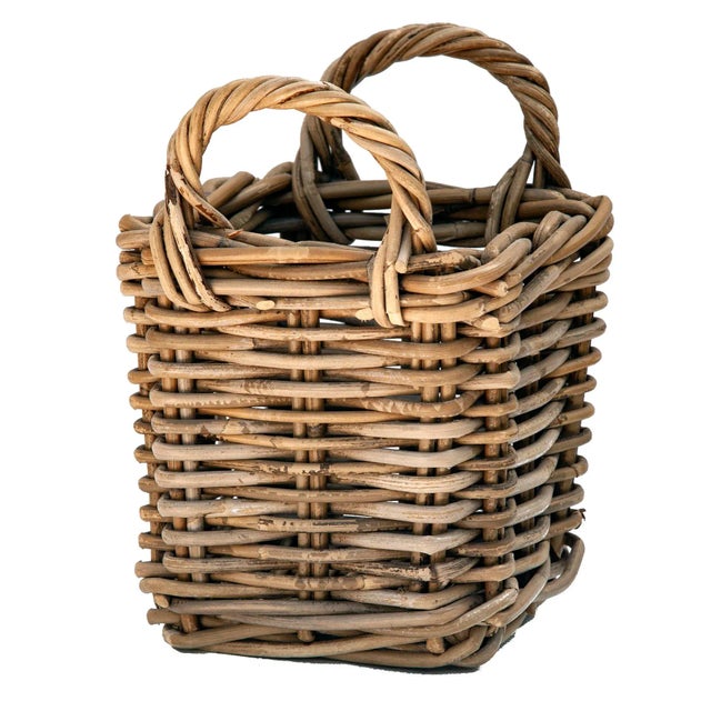 Hand made willow basket with twisted handles.