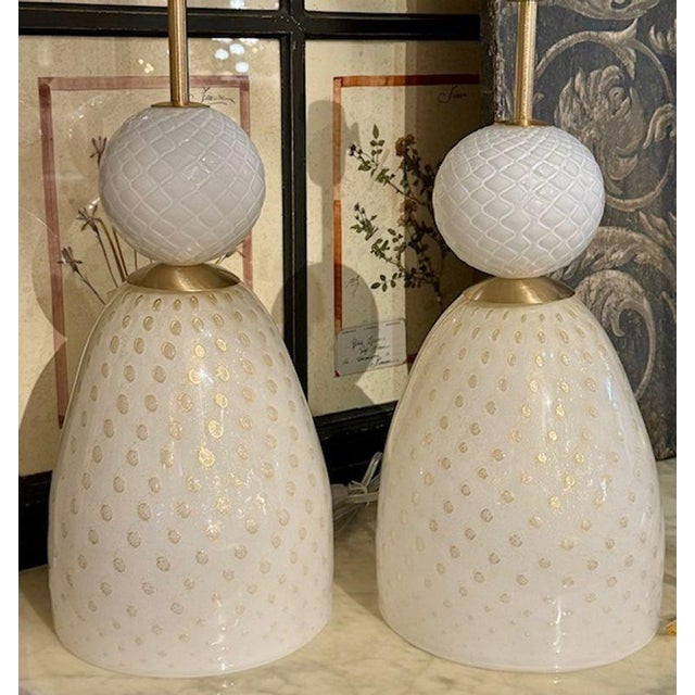 Pair of modern Murano style ivory and gold glass lamps. Circa 2000. Perfect for today's transitional designs! 20'H x 8"w