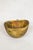 This hand-carved wooden bowl is made by the Turkana, a nomadic community in north-west Kenya prized for their woodcarving...