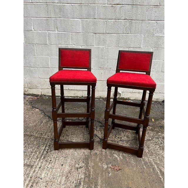 Pair Vintage Jacobean style Hardwood Bar Stools unmarked but Well made, sturdy , brass nailed Approximate Height 39” width...