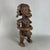 An imposing and mesmerizing solid wood ritual altar statue, attributed to traditional 20th-century Central West African...