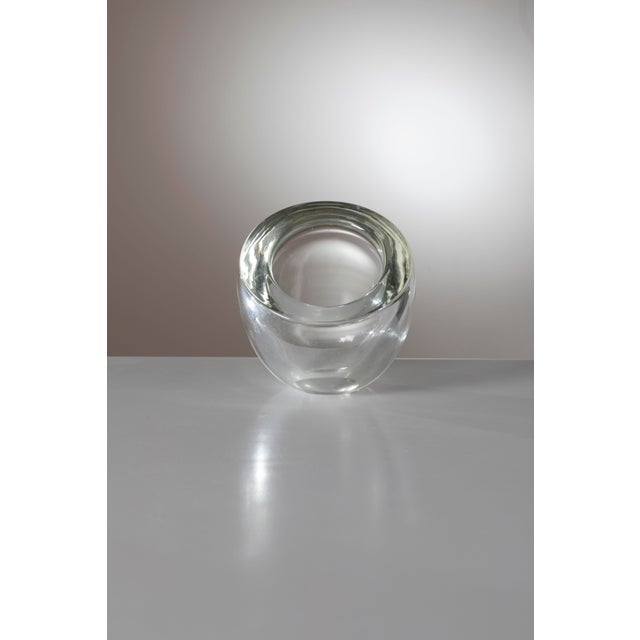 Heavy-gauge clear art glass vase, designed and executed by the legendary Muranese master Alfredo Barbini during the 1960s....