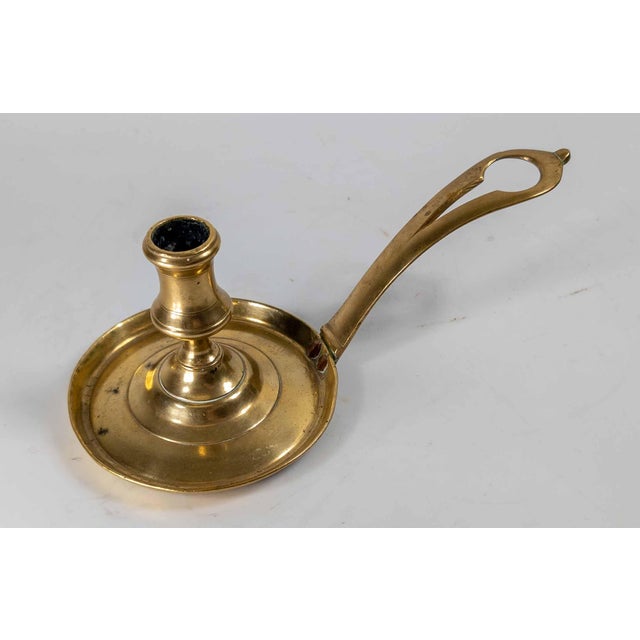 We are selling this very nice 18th century French or Flemish candlestick. This candlestick has relatively rare frying pan...