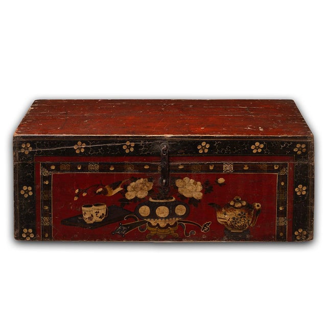 This classic wooden box was originally used for storing personal items, both at home and during travel. It maintains its...